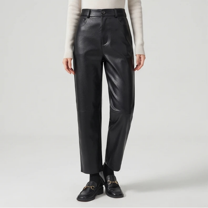 Black leather pants on an off-gray studio background - 3