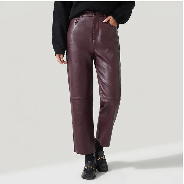 Burgundy leather pants on an off-gray studio background - 3