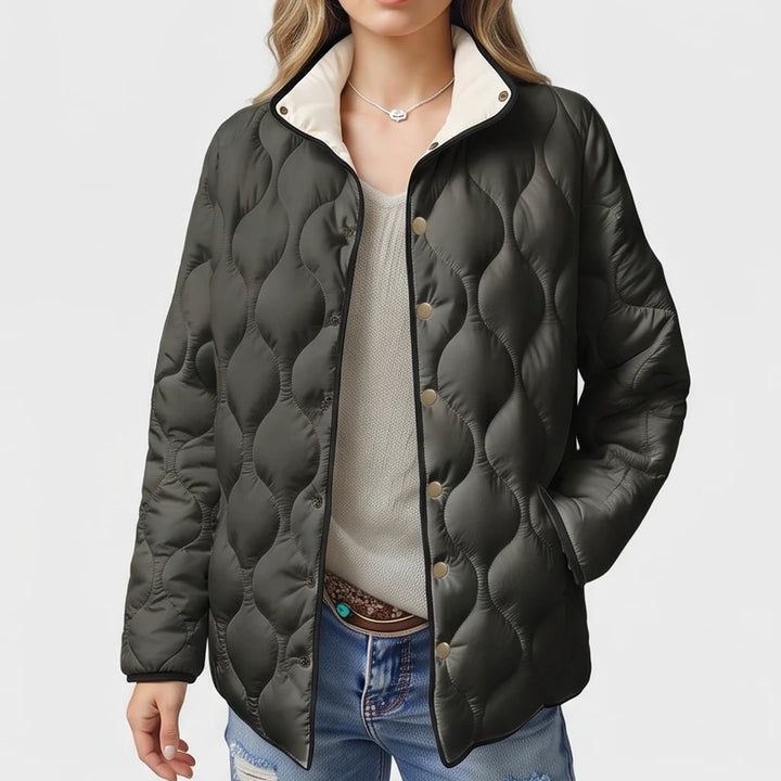 Black cotton jackets on an off-gray studio background - 2