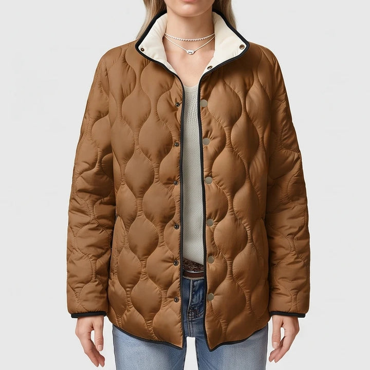 Brown cotton jackets on an off-gray studio background