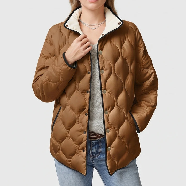 Brown cotton jackets on an off-gray studio background - 2