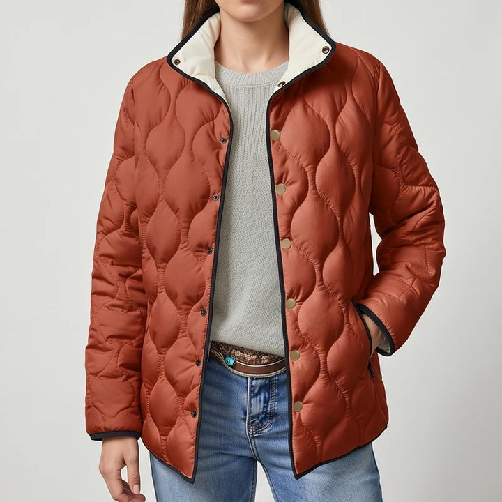 Orange cotton jackets on an off-gray studio background - 2