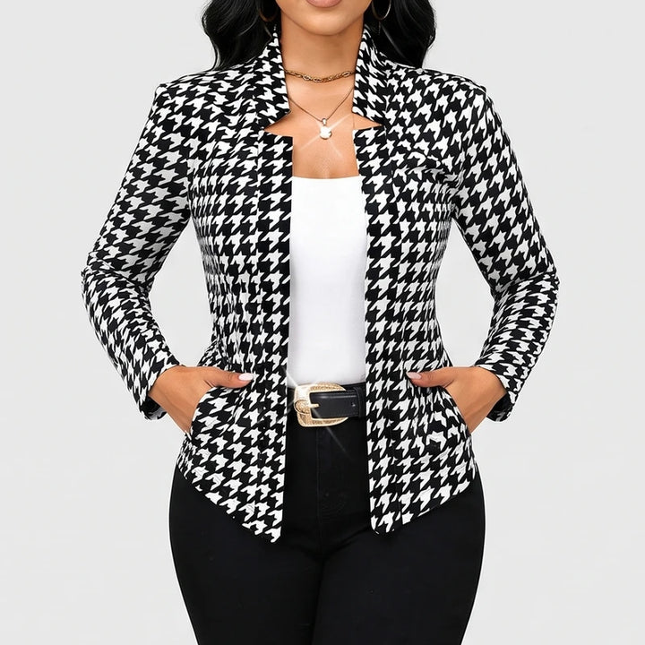 Brown blazer on an off-gray studio background