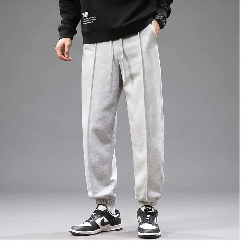 Model wearing Gray apparel in a studio