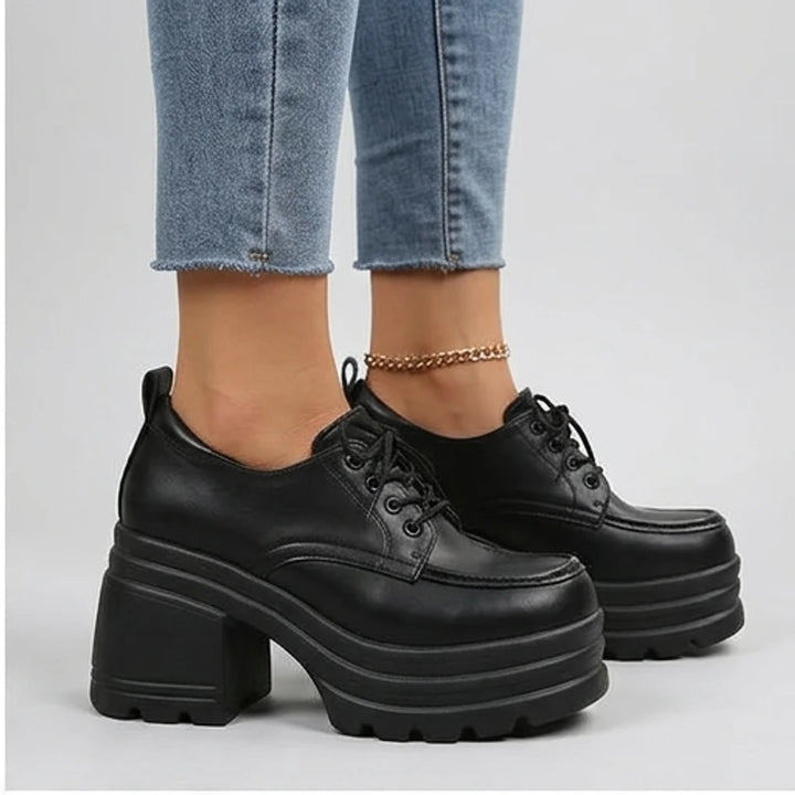 Model wearing Black Veya Chunky Platform Leather Boots in studio - 2