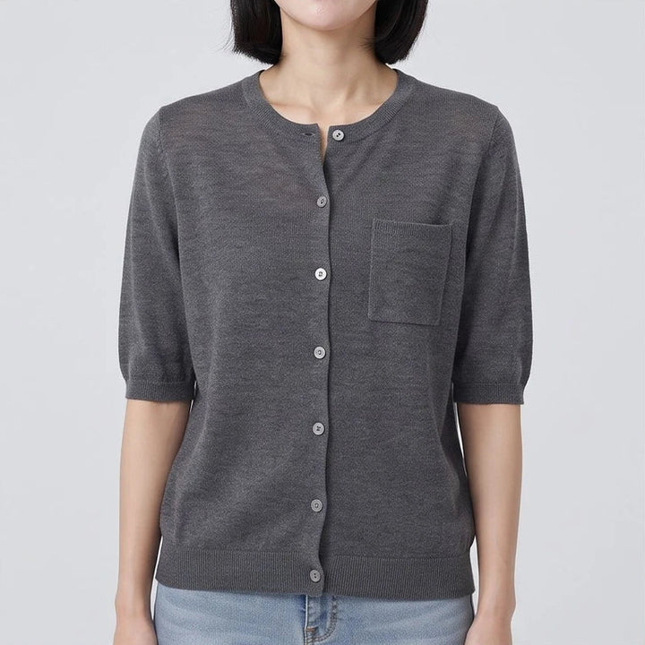 Model wearing Gray cardigan in a studio