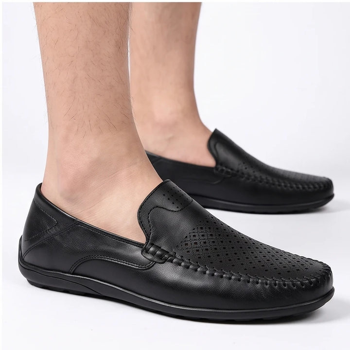 Model wearing Black leather loafers in a studio - 2