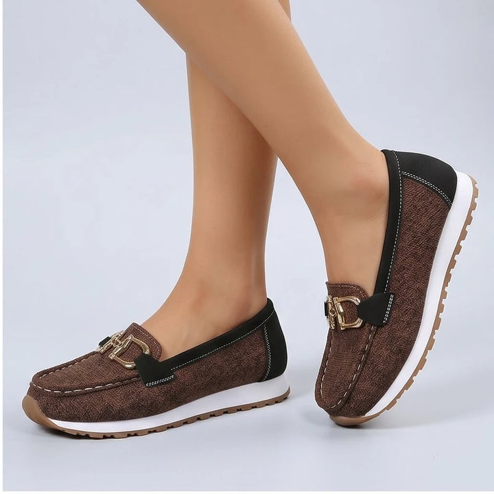 Model wearing Brown metal flat in a studio - 2
