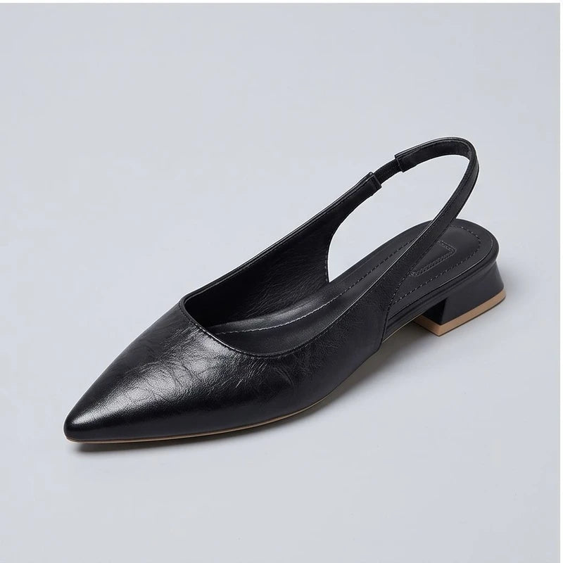 Black leather flats in a studio background - 3