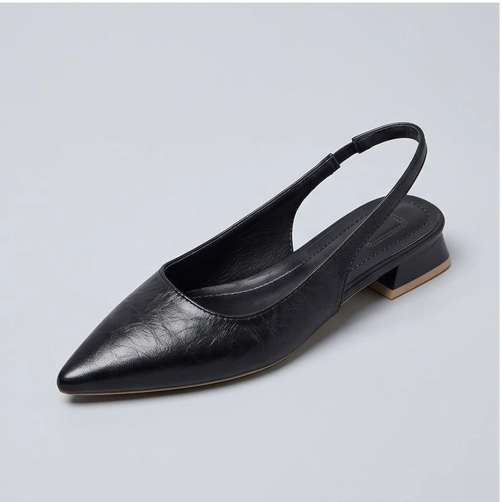 Black leather flats in a studio background - 3