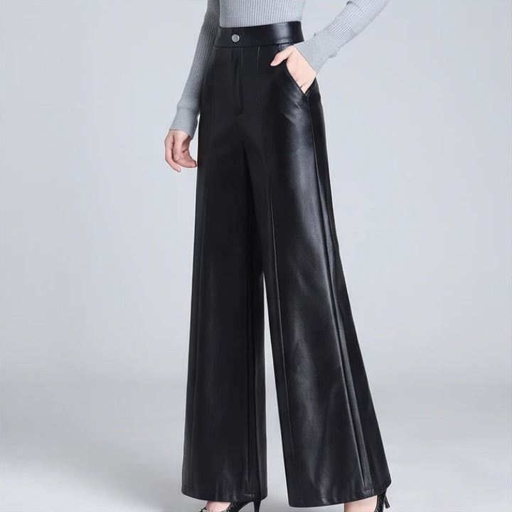 Black leather pants on an off-gray studio background - 2