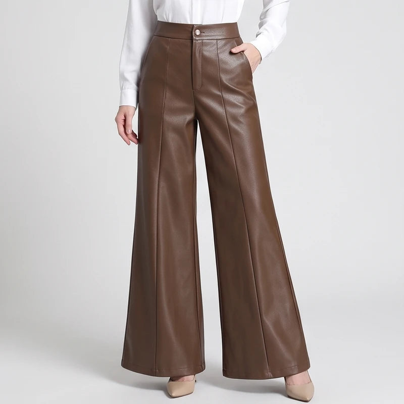 Coffee leather pants on an off-gray studio background - 2