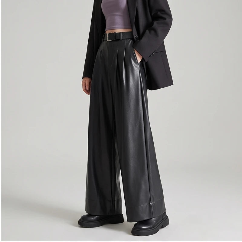 Black leather pants on an off-gray studio background - 2