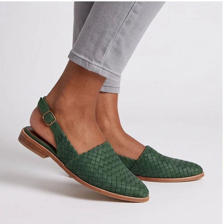 Model wearing Green woven loafers in a studio - 2