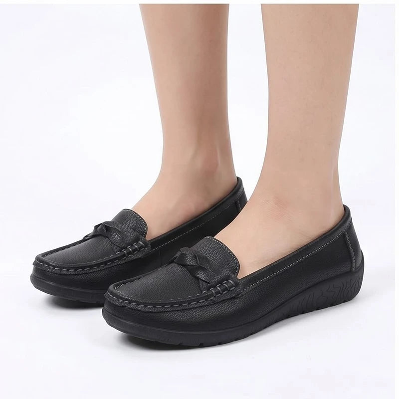 Model wearing Black leather flats in a studio - 3