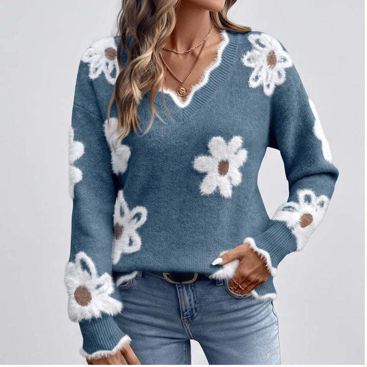 Model wearing Ocean Blue knit sweater in a studio