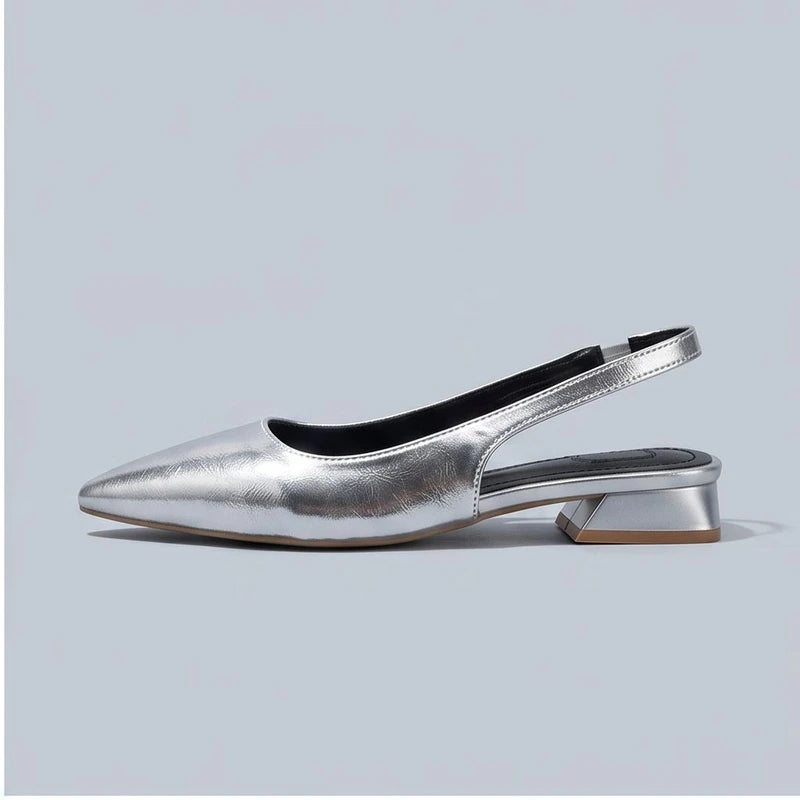 Silver leather flats in a studio background - 2