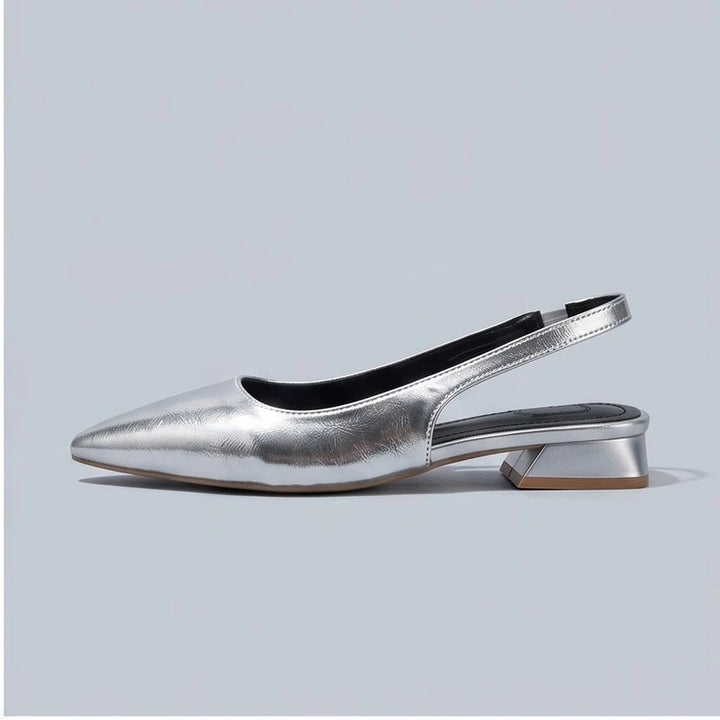 Silver leather flats in a studio background - 2
