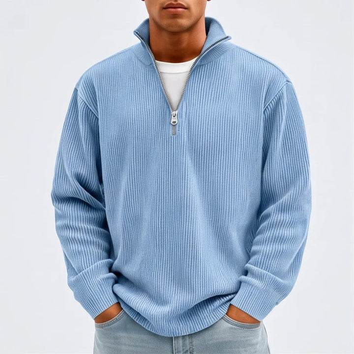 Model wearing Blue corduroy pullover in a studio
