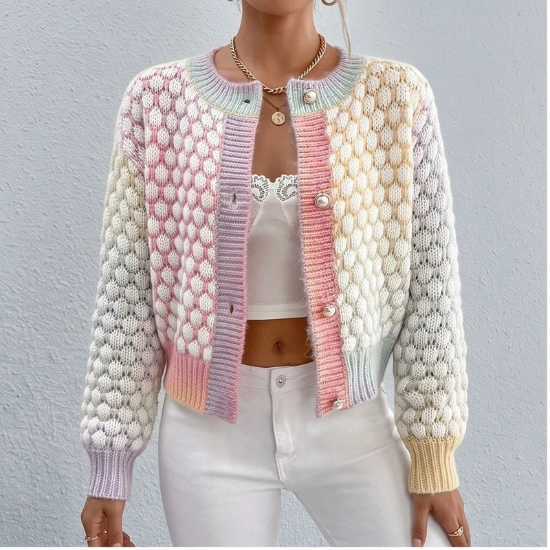 Model wearing MULTI cardigan in a studio