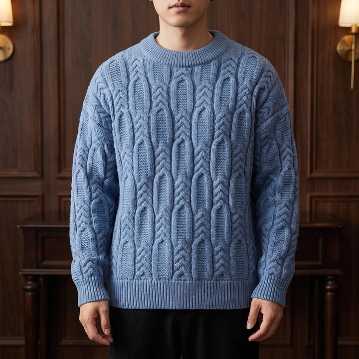 Blue knit pullover in a dark wood interior