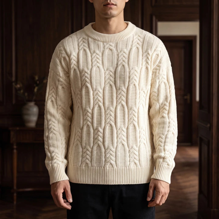 White knit pullover in a dark wood interior