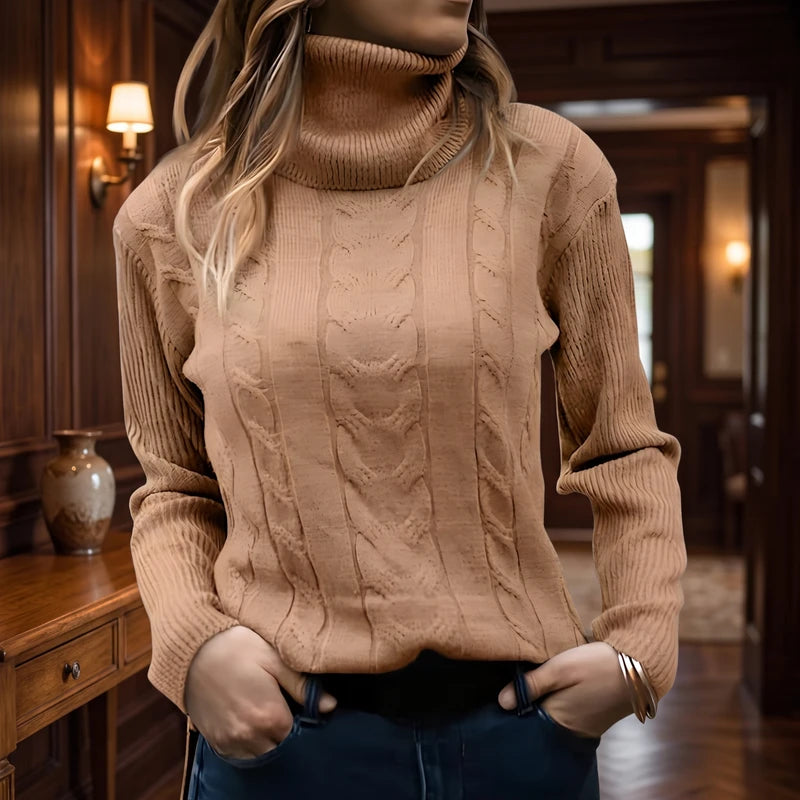 Beige knit sweater in a dark wood interior