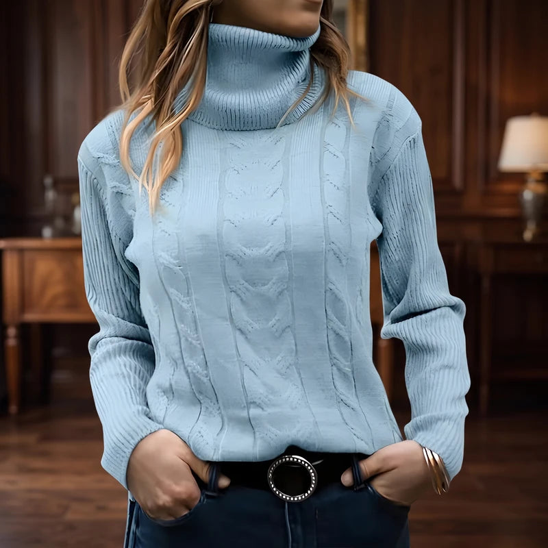 Blue knit sweater in a dark wood interior
