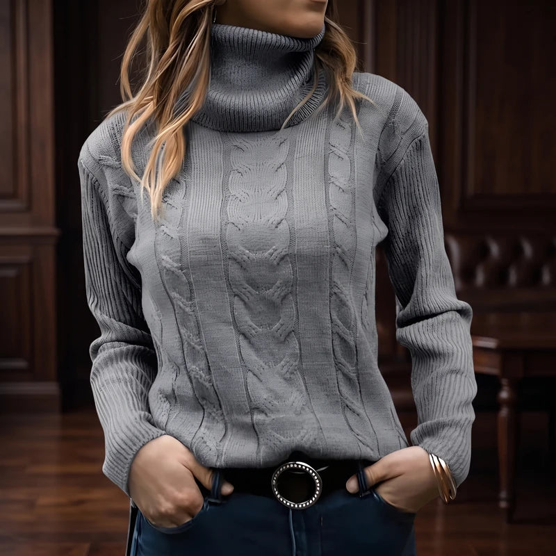 Gray knit sweater in a dark wood interior