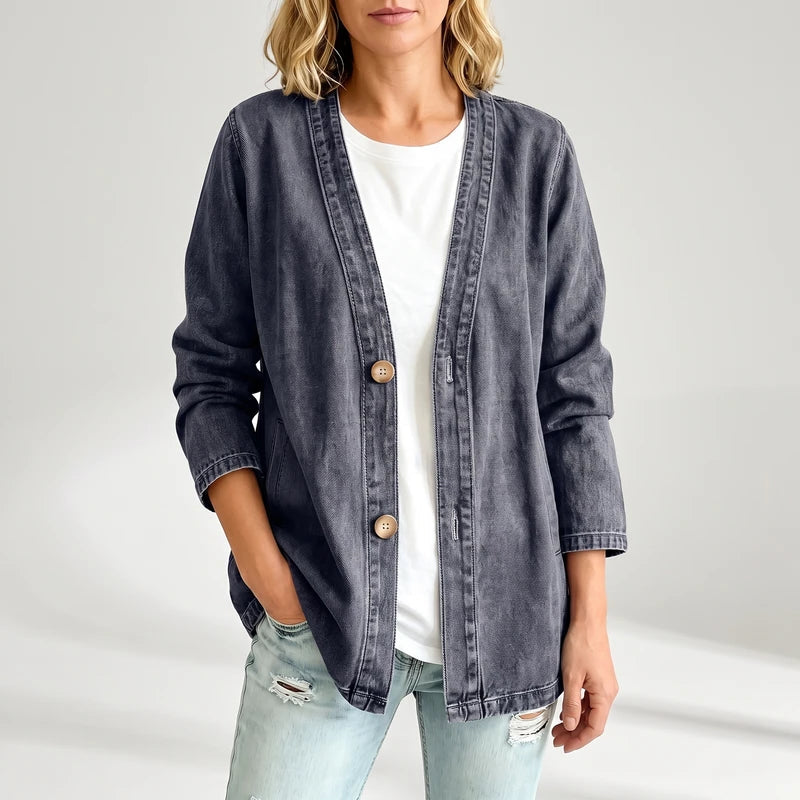 Black cardigan on an off-gray studio background