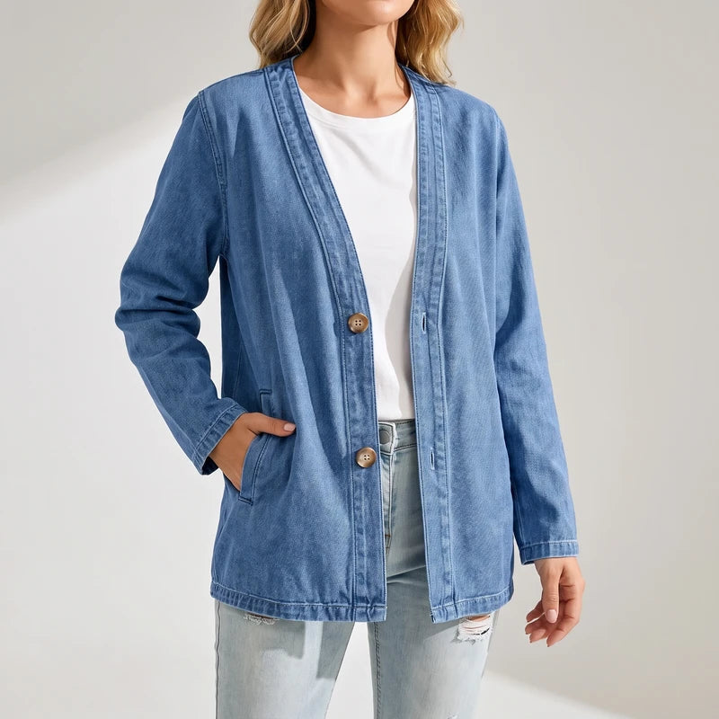 Blue cardigan on an off-gray studio background