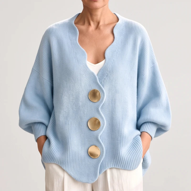 Light  Blue knit sweater on an off-gray studio background