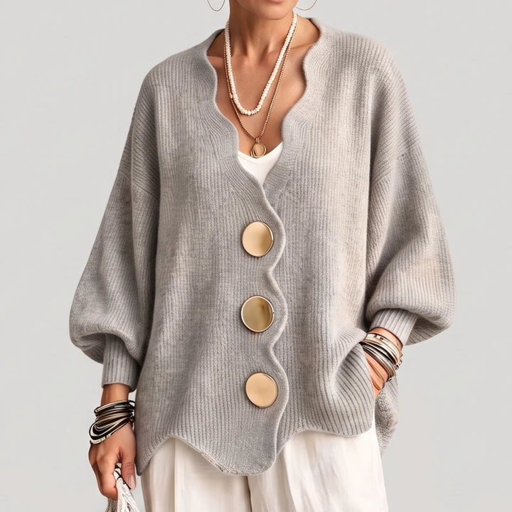 Light Grey knit sweater on an off-gray studio background - 2