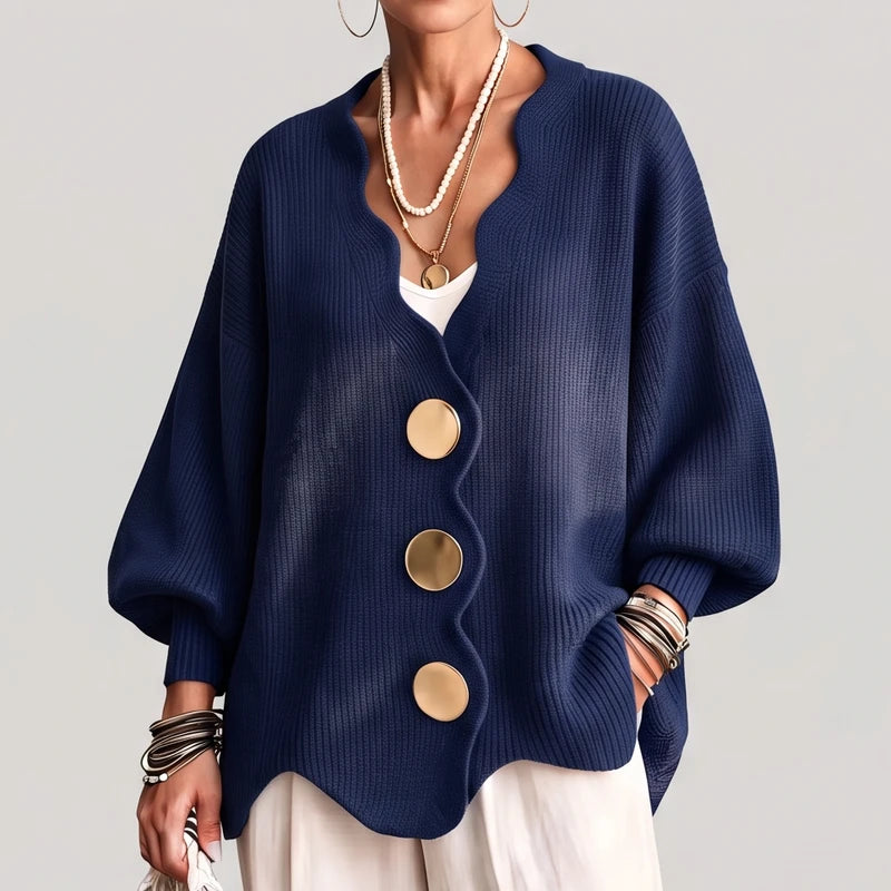 Navy Blue knit sweater on an off-gray studio background