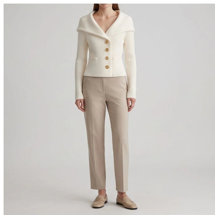 Model wearing white knitted jacket in a studio - 2