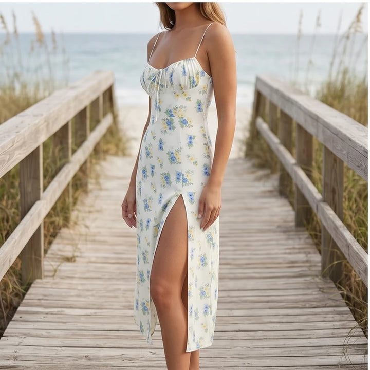 Model wearing White Seraphine Floral Midi Slip Dress outdoors - 2
