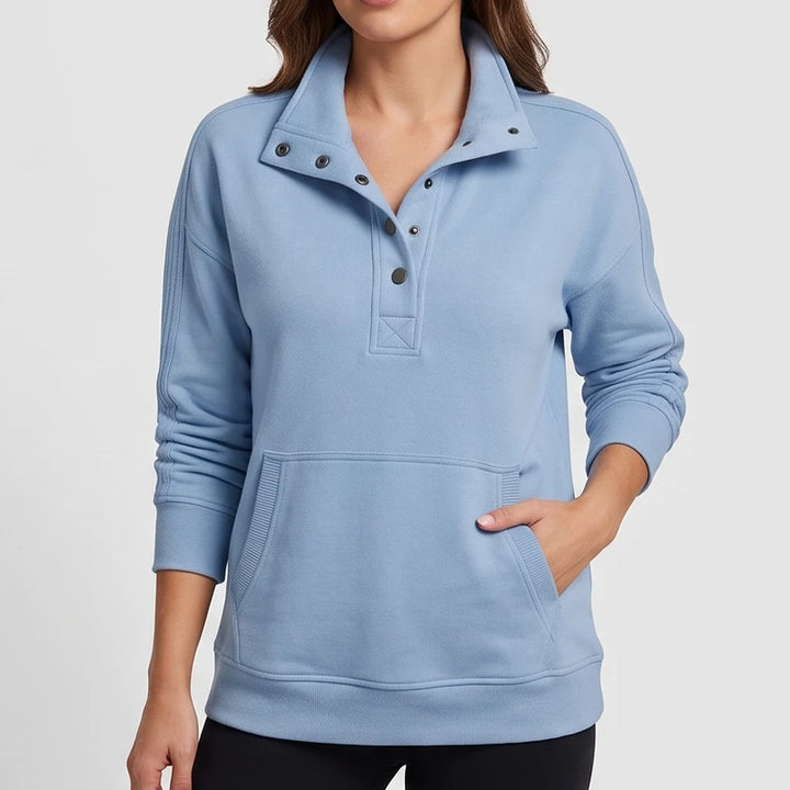 SKY BLUE pullover on an off-gray studio background