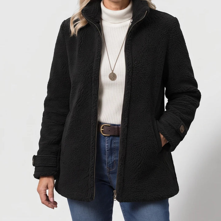 Black jacket on an off-gray studio background - 2