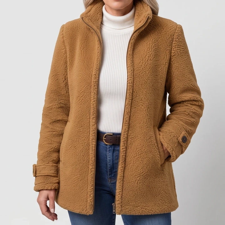 Camel jacket on an off-gray studio background - 2
