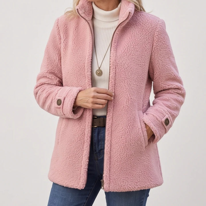 Pink jacket on an off-gray studio background - 2