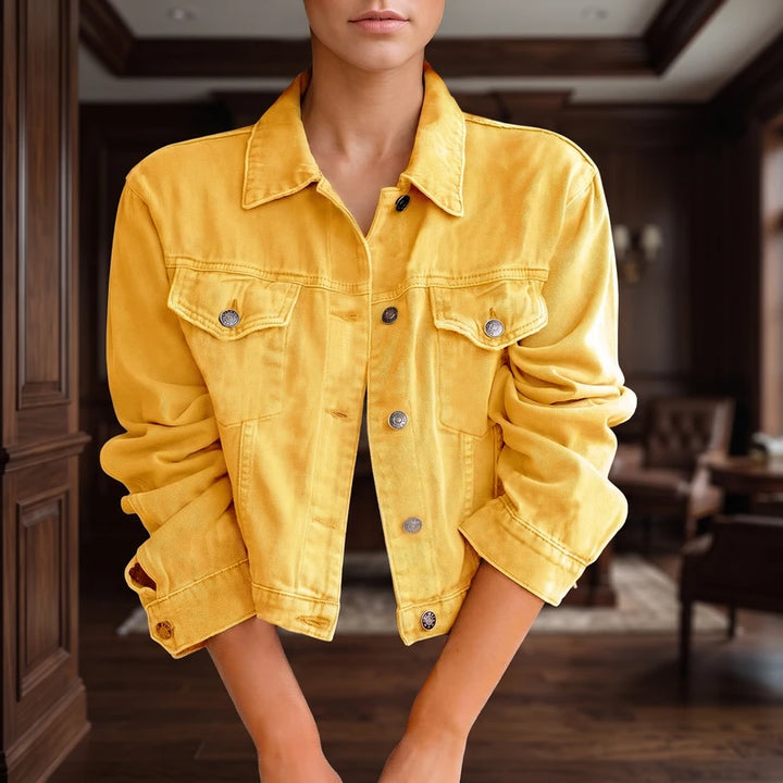 Yellow denim jacket in a dark wood interior
