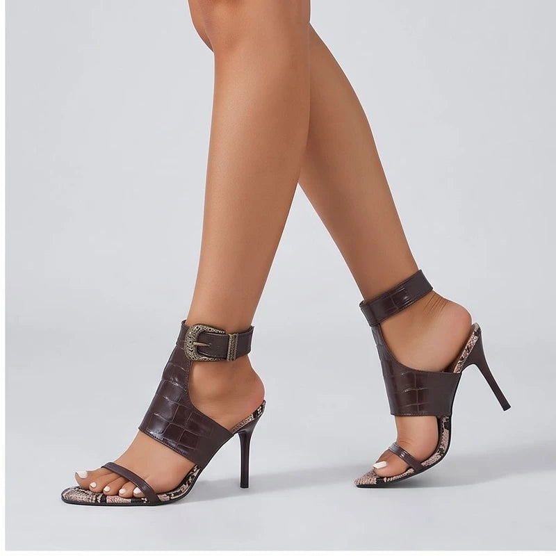 Model wearing Brown heel in a studio
