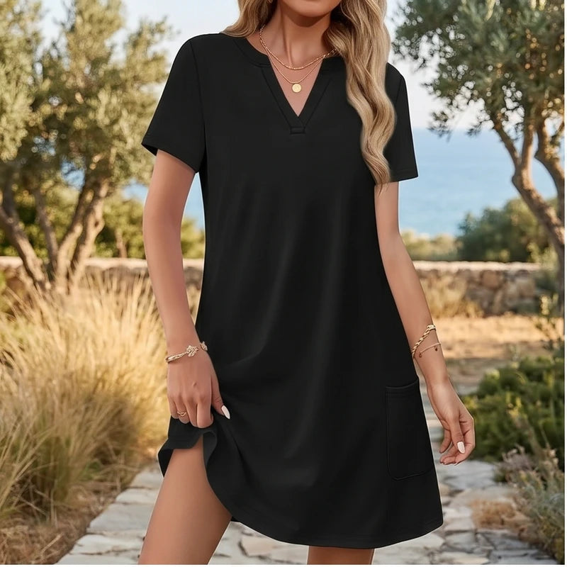 Model wearing A Women's Dress New Summer Casual V-Neck Wedding Loose Dress Short Sleeve Fashion Beach Vacation Wear dress outdoors