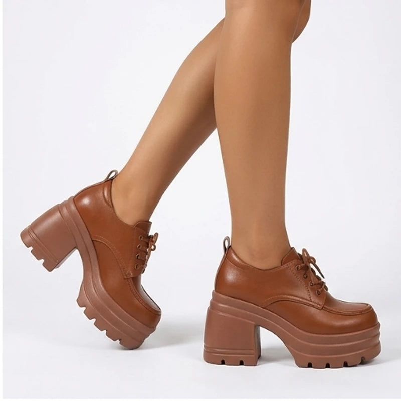 Model wearing Brown Veya Chunky Platform Leather Boots in studio - 2