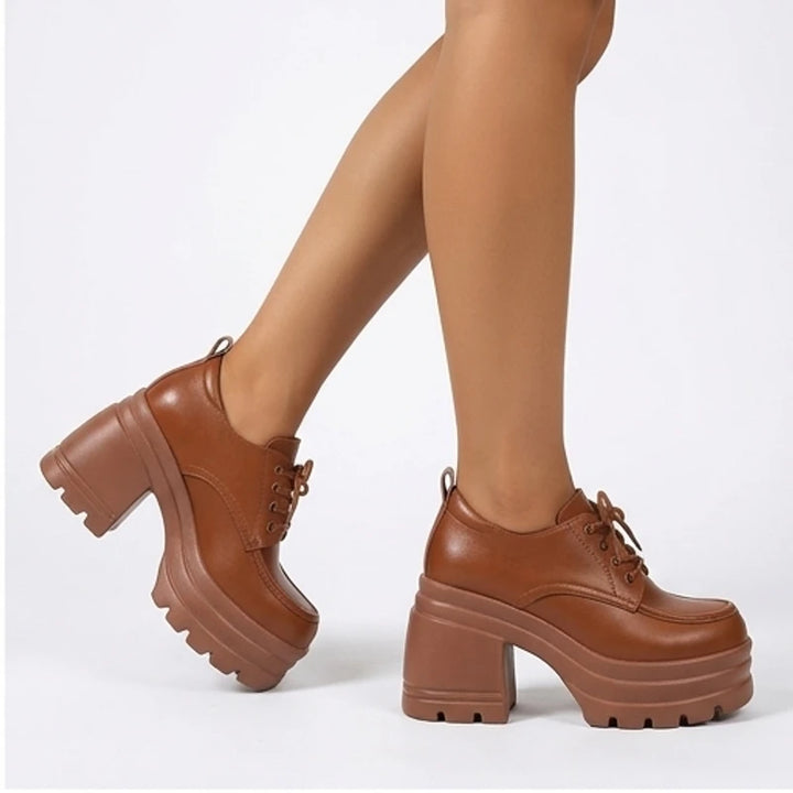 Model wearing Brown Veya Chunky Platform Leather Boots in studio - 2