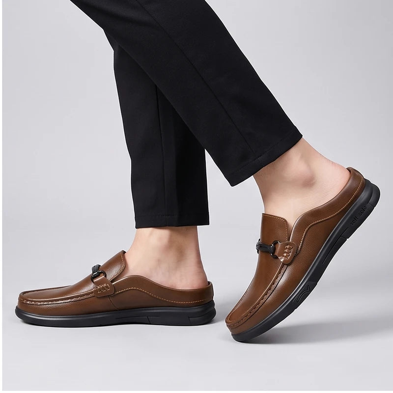 Model wearing Brown leather mules in a studio - 2