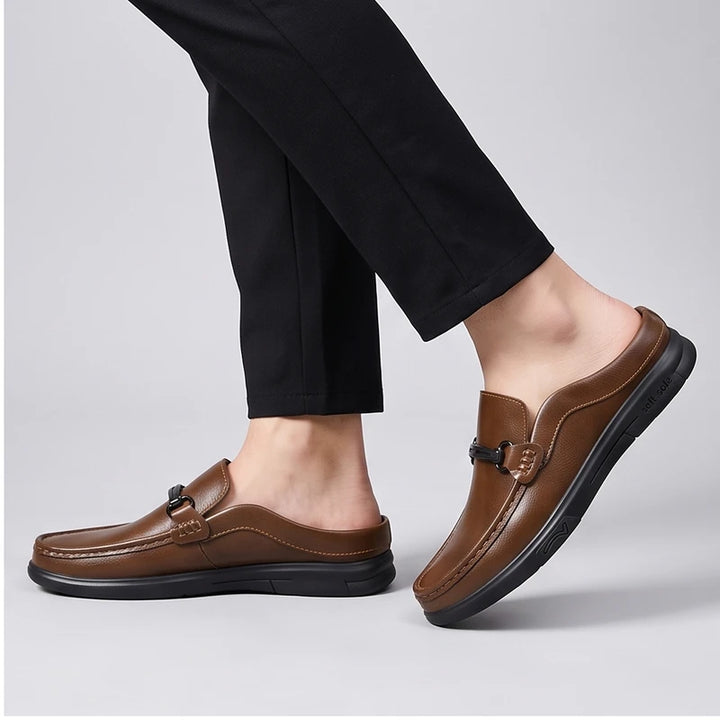 Model wearing Brown leather mules in a studio - 2