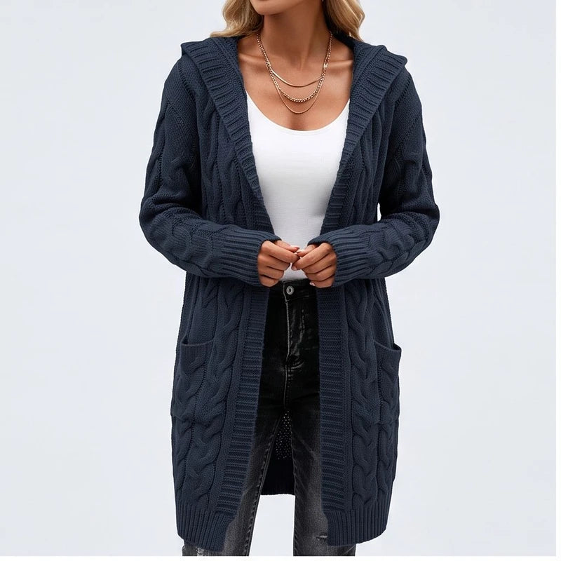 Model wearing E cardigan in a studio