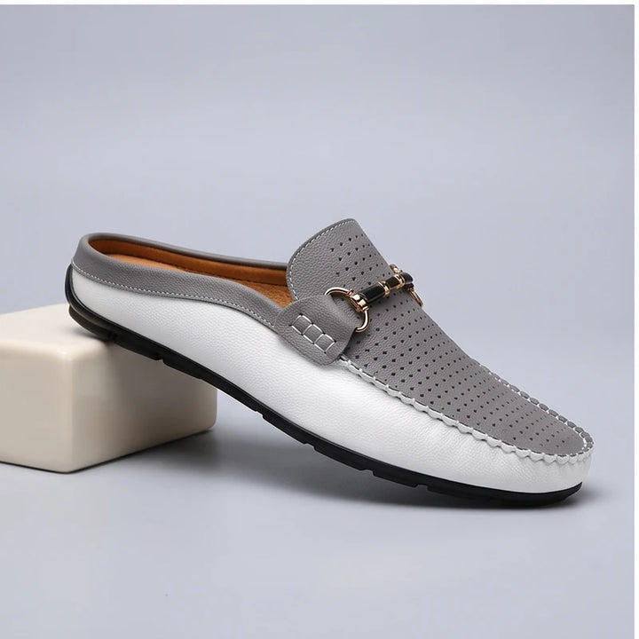 Gray leather loafers in a studio background - 3