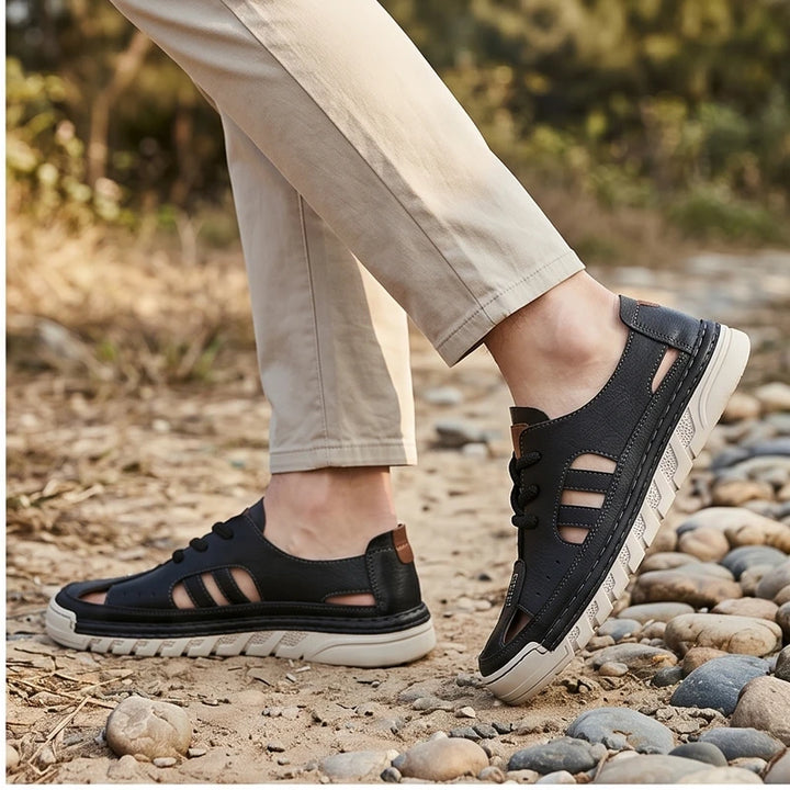 Model wearing Black New Arrival Men Leather Sandals Slip on Beach Shoes Breathable Summer Casual Shoe Light Sandales Non Slip Male Wading Aqua Shoes outdoors - 2